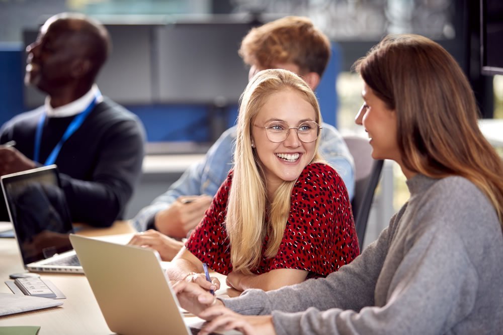 Smiling student with guidance councillor